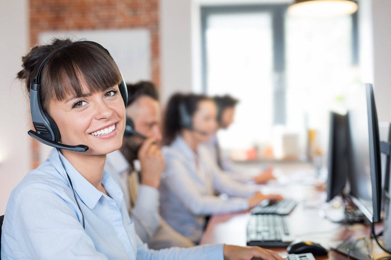 Call center worker accompanied by her team.